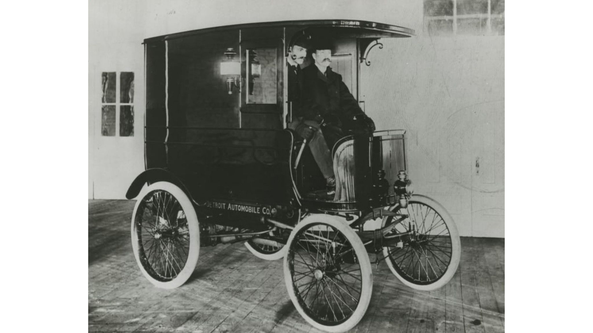 Henry Ford shows off the first vehicle made by the Detroit Automobile Company, a delivery wagon. Photo courtesy of the Henry Ford Museum of American Innovation